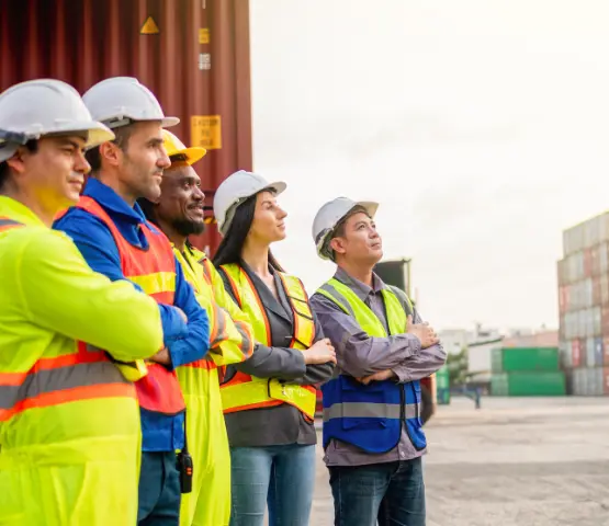 heavy construction equipment on flatbed for delivery