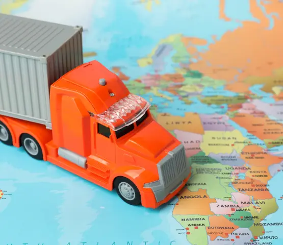 heavy construction equipment on flatbed for delivery