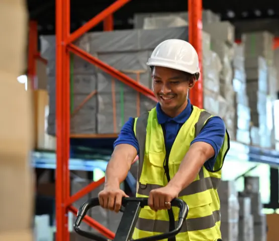 heavy construction equipment on flatbed for delivery